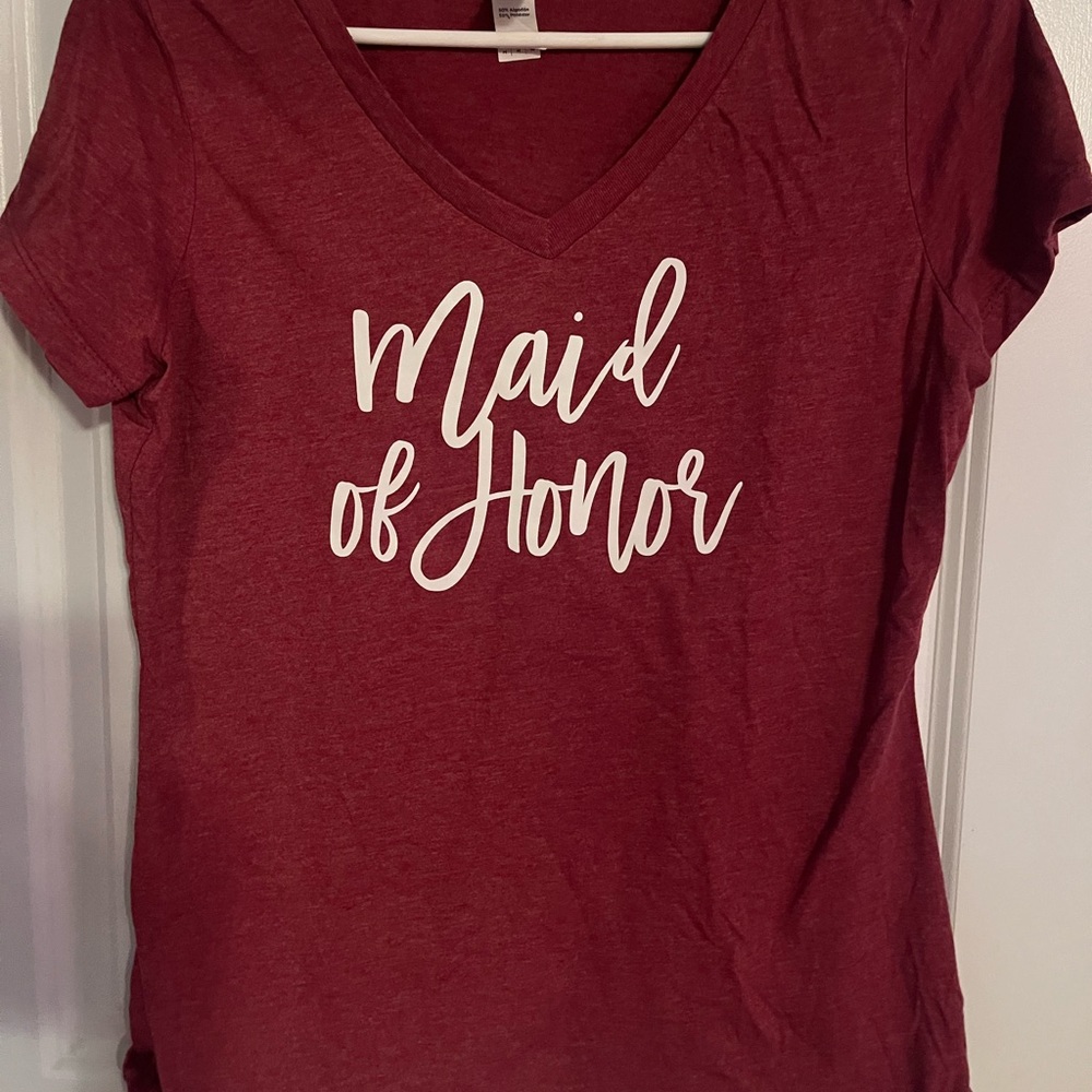 A maroon colored maid of honor v neck tshirt